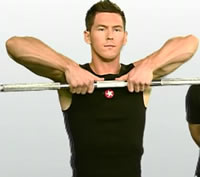 Man performing the upright row exercise