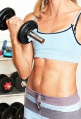 Young lady holding light weights