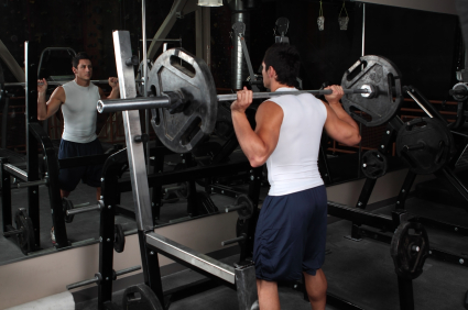 Man performing the squat exercise